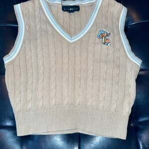 Trippy mushroom cropped sweater vest. Perfect for fall.